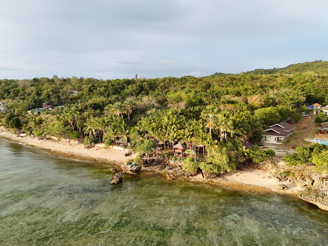 Drone photograph of coastal property and surrounding land