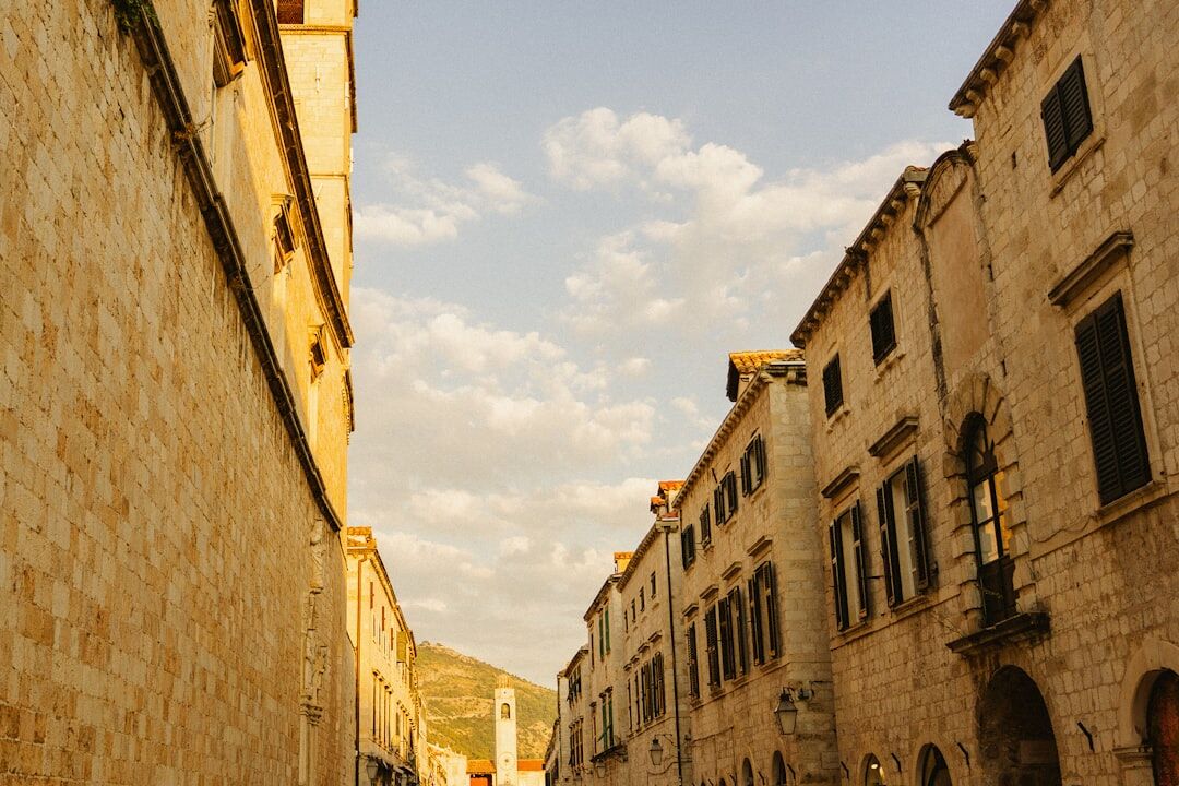 Narrow stone street in Dubrovnik old town with hanging laundry