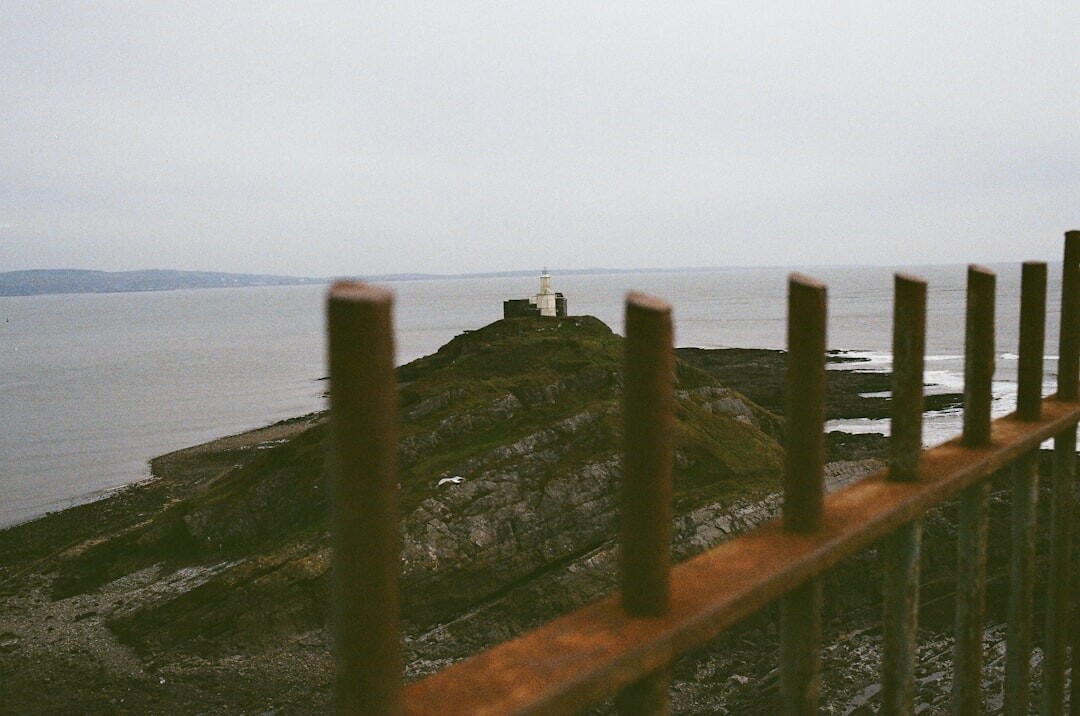 Small stone church overlooking the sea on island hilltop