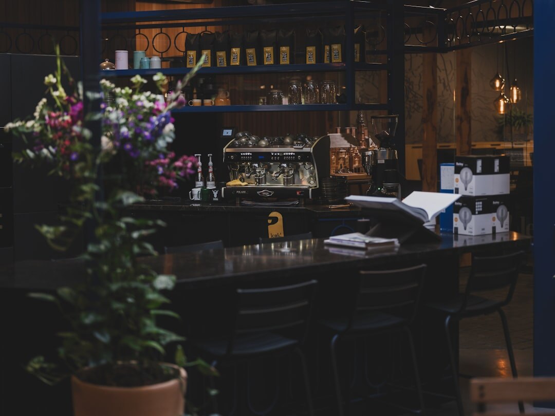 Cozy cafe corner with vintage furniture and plants