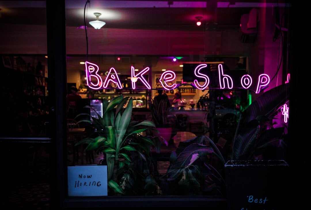 Freshly baked pastries displayed in bakery shop window