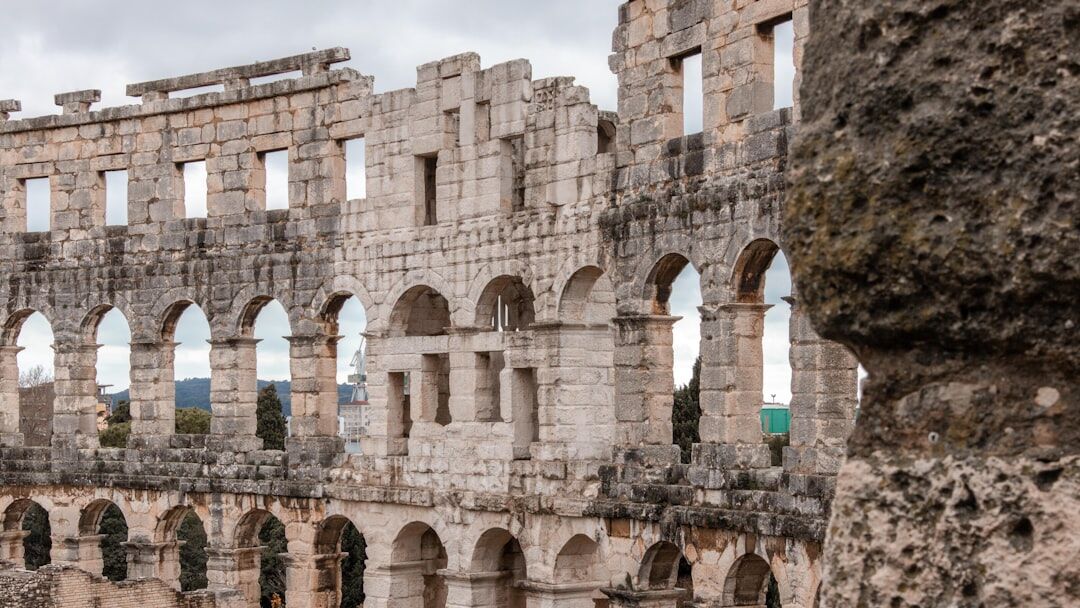 Roman amphitheater Arena in Pula at dusk