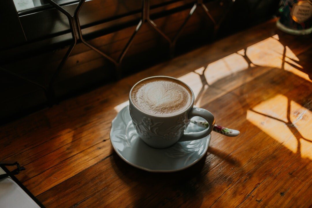 Steam rising from coffee cup at Zagreb street cafe