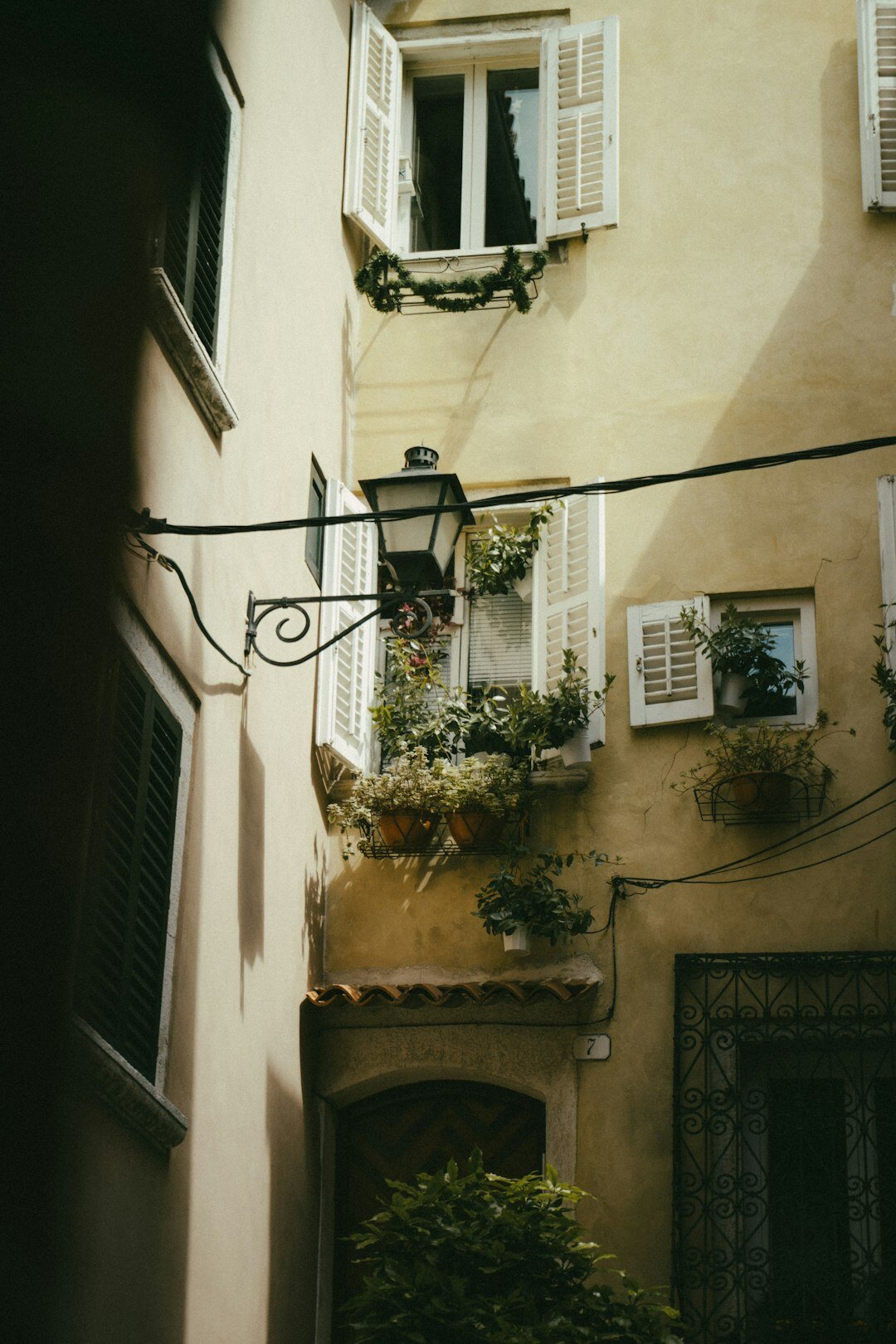 Fine art print of Rovinj alley with hanging lanterns