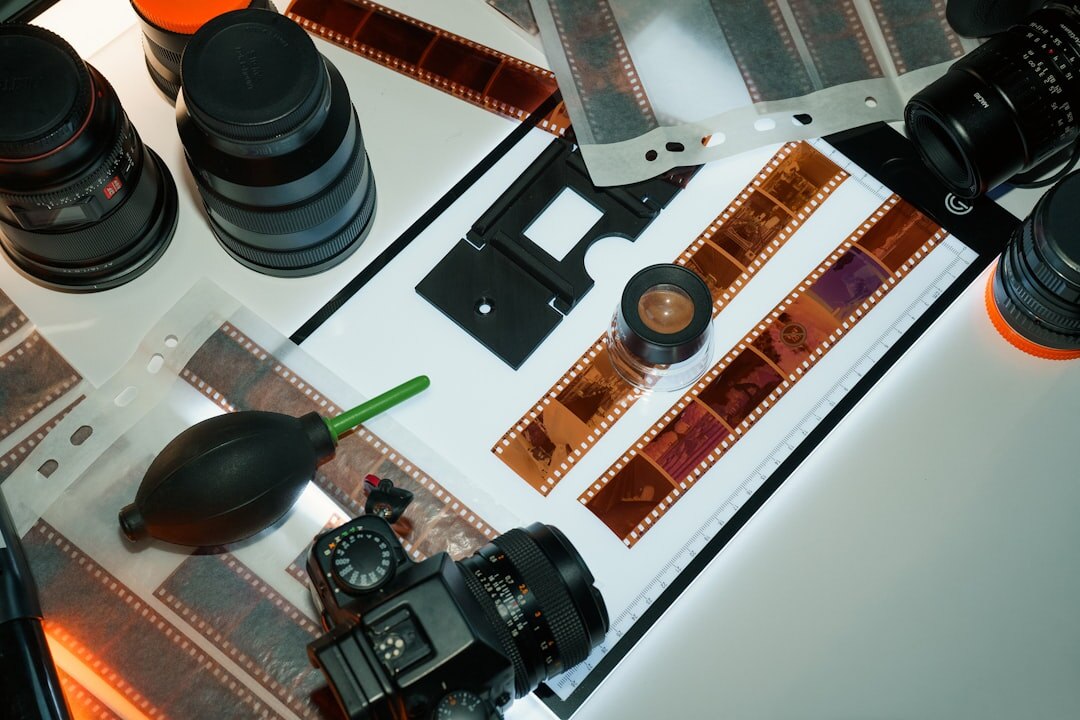 Contact sheet of film negatives on light table